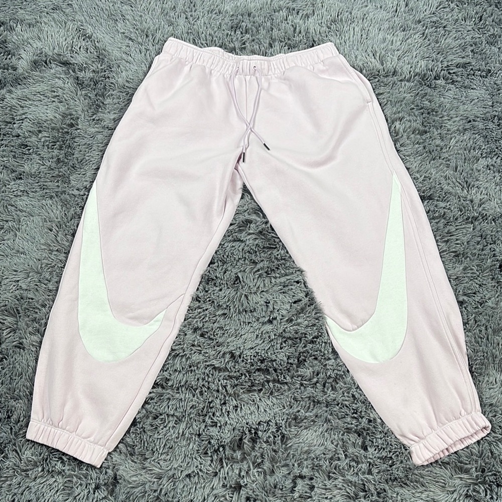NIke women Swoosh Fleece sweatpants jogger in lobster pink